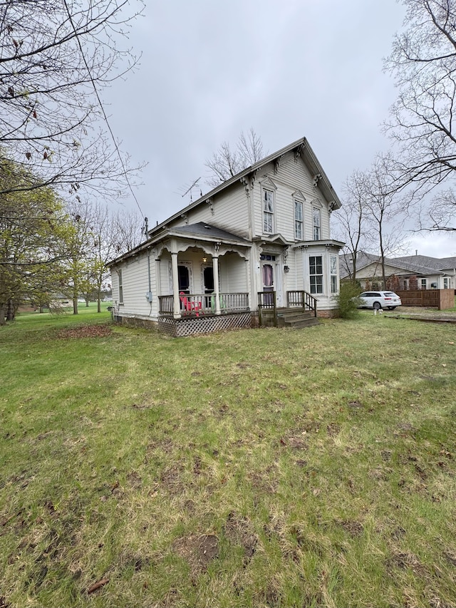 8083 S State Rd, Goodrich, MI 48438 - italianate home featuring a front yard