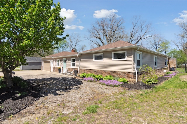 2510 Ruth Dr, Fenton, MI 48430 - view of front of home featuring an attached garage and concrete driveway