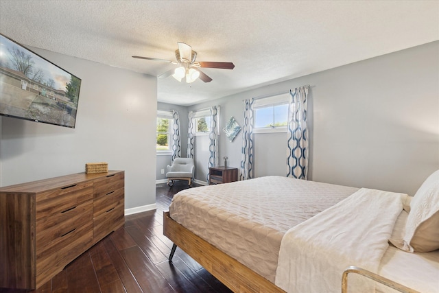 2510 Ruth Dr, Fenton, MI 48430 - bedroom with hardwood / wood-style flooring, baseboards, a ceiling fan, and a textured ceiling
