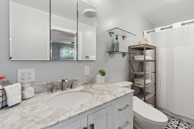 2510 Ruth Dr, Fenton, MI 48430 - full bath with toilet, vanity, and a shower with shower curtain