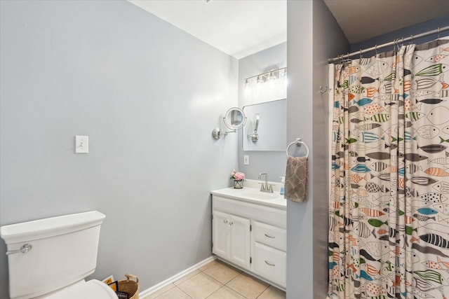 2510 Ruth Dr, Fenton, MI 48430 - bathroom with tile patterned floors, toilet, vanity, baseboards, and a shower with curtain