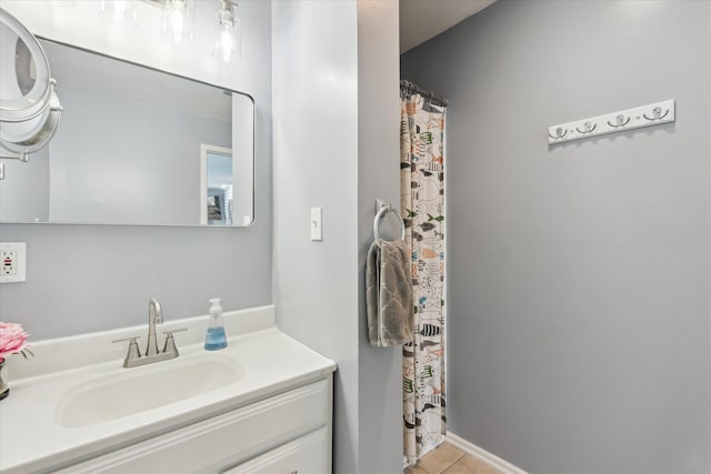2510 Ruth Dr, Fenton, MI 48430 - full bathroom featuring vanity, tile patterned flooring, and a shower with shower curtain