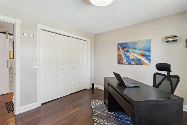 2510 Ruth Dr, Fenton, MI 48430 - office with dark wood-style floors, baseboards, and a textured ceiling