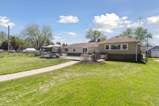 2510 Ruth Dr, Fenton, MI 48430 - view of front of house featuring brick siding, an outdoor pool, and a chimney