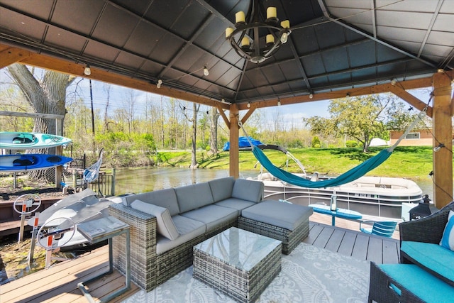 2510 Ruth Dr, Fenton, MI 48430 - wooden deck featuring a gazebo, a water view, and an outdoor hangout area