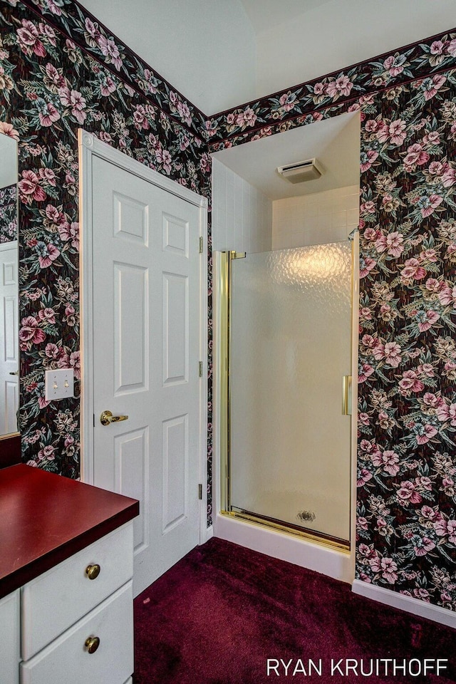3076 Regency Pkwy, Zeeland, MI 49464 - full bath featuring wallpapered walls, visible vents, and a shower stall