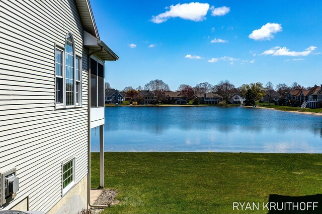 3076 Regency Pkwy, Zeeland, MI 49464 - view of yard with a residential view and a water view