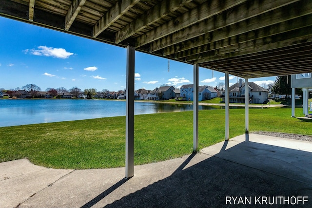 3076 Regency Pkwy, Zeeland, MI 49464 - view of patio featuring a residential view and a water view