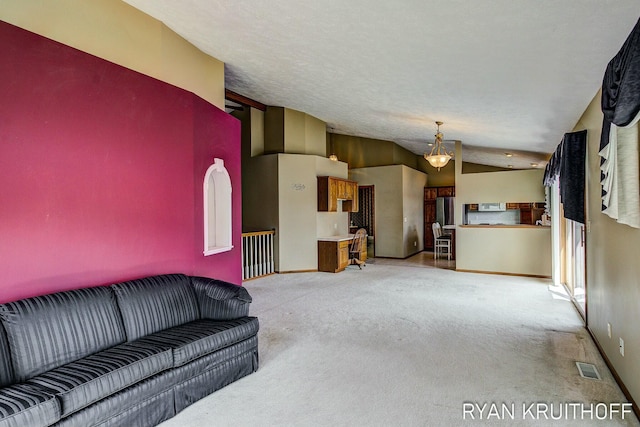 3076 Regency Pkwy, Zeeland, MI 49464 - unfurnished living room with vaulted ceiling, visible vents, and light carpet