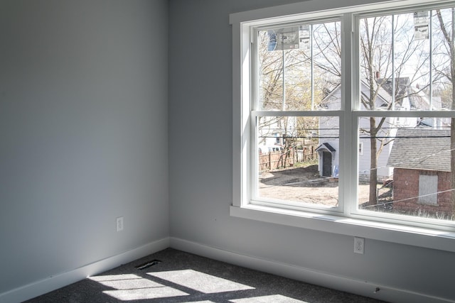 1024 Clinton Ave, Kalamazoo, MI 49001 - carpeted spare room featuring baseboards