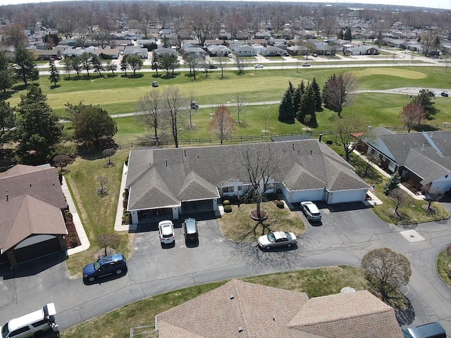 birds eye view of property with a residential view and golf course view