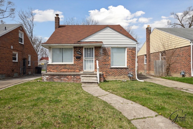 19931 Braile St, Detroit, MI 48219 - bungalow-style house with a front lawn, brick siding, and a chimney