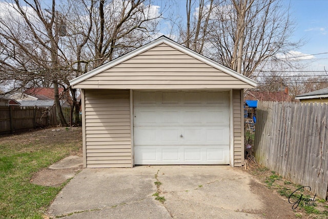 19931 Braile St, Detroit, MI 48219 - detached garage featuring fence and concrete driveway
