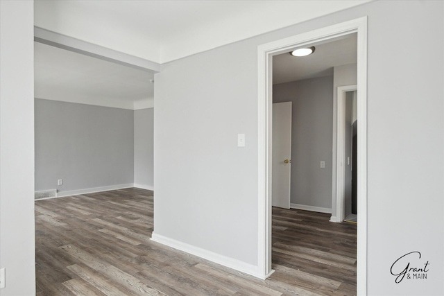 19931 Braile St, Detroit, MI 48219 - empty room featuring wood finished floors and baseboards