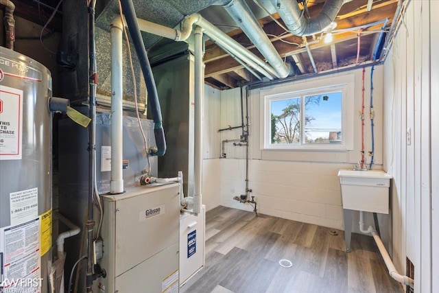 utilities with heating unit and gas water heater