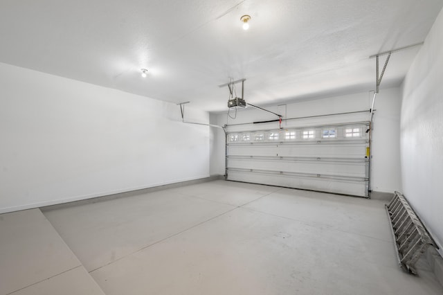 816 Tioga Park, Big Rapids, MI 49307 - garage featuring a garage door opener