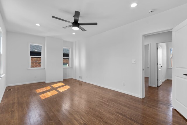 empty room with recessed lighting, wood finished floors, visible vents, and ceiling fan