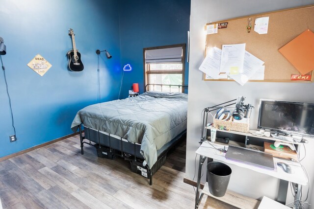 7841 Peninsular Dr, Farwell, MI 48622 - bedroom featuring wood finished floors