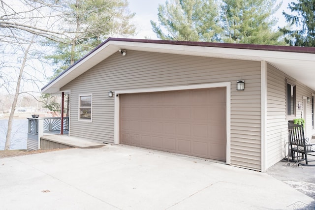7841 Peninsular Dr, Farwell, MI 48622 - garage with driveway