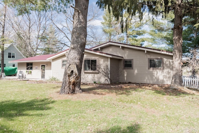 7841 Peninsular Dr, Farwell, MI 48622 - exterior space with fence and a lawn