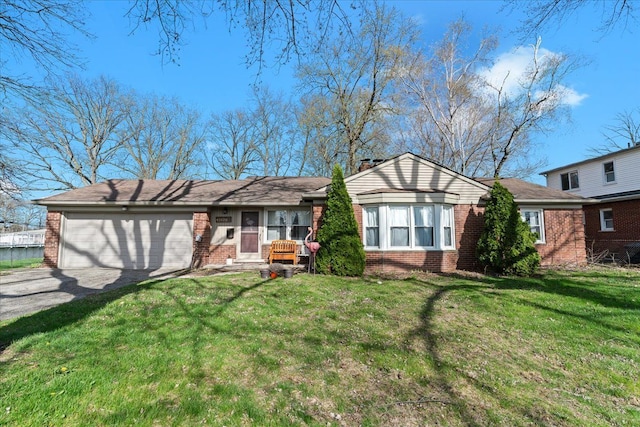 45520 Deshon St, Utica, MI 48317 - ranch-style house featuring a garage, brick siding, a front yard, and concrete driveway