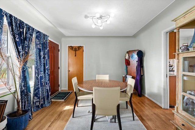 45520 Deshon St, Utica, MI 48317 - dining space featuring light wood-style floors and baseboards