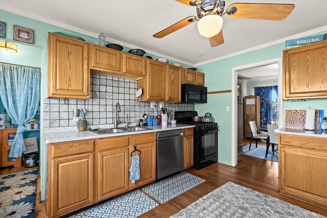 45520 Deshon St, Utica, MI 48317 - kitchen featuring a ceiling fan, a sink, black appliances, light countertops, and backsplash