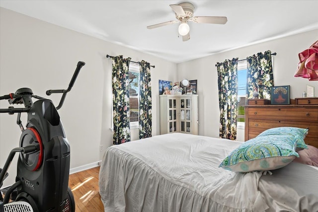 45520 Deshon St, Utica, MI 48317 - bedroom featuring baseboards, wood finished floors, and ceiling fan
