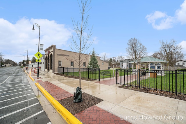 - W Main Street, Marcellus, MI 49067 - exterior space featuring a residential view, a gazebo, fence, a yard, and uncovered parking