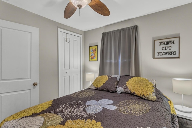 bedroom featuring a ceiling fan and a closet