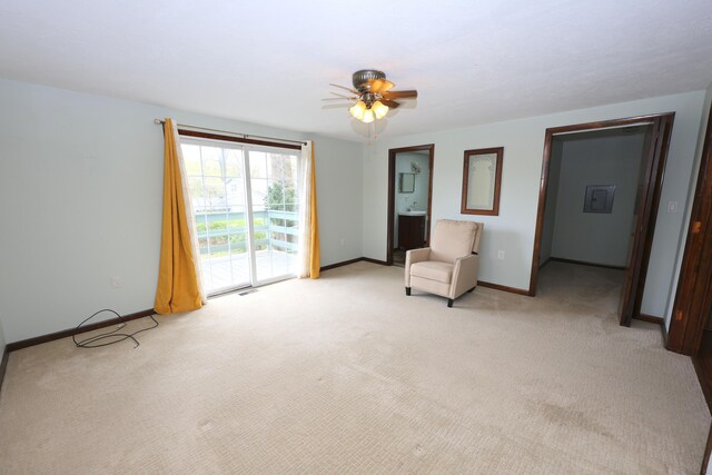 69369 Oak St, Benton Harbor, MI 49022 - unfurnished room featuring light carpet, baseboards, and ceiling fan