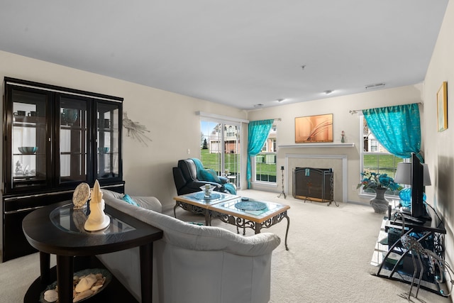 52140 Naugatuck Dr, Macomb, MI 48042 - carpeted living area featuring a fireplace and visible vents