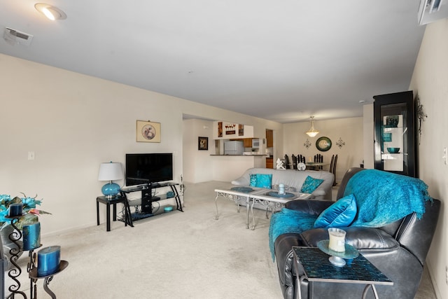 52140 Naugatuck Dr, Macomb, MI 48042 - living area with carpet floors and visible vents