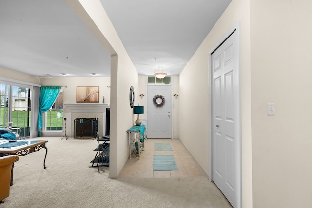 52140 Naugatuck Dr, Macomb, MI 48042 - interior space with baseboards, tile patterned flooring, and carpet