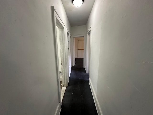 15815 Linwood St, Detroit, MI 48238 - hallway featuring baseboards and wood finished floors