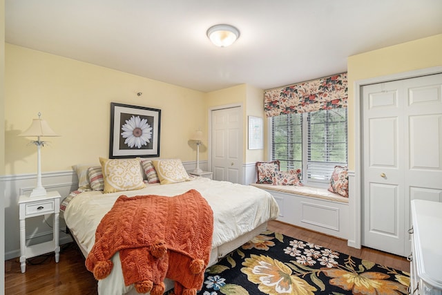 975 Pine Needle Trl, Rochester, MI 48306 - bedroom with dark wood-type flooring and multiple closets