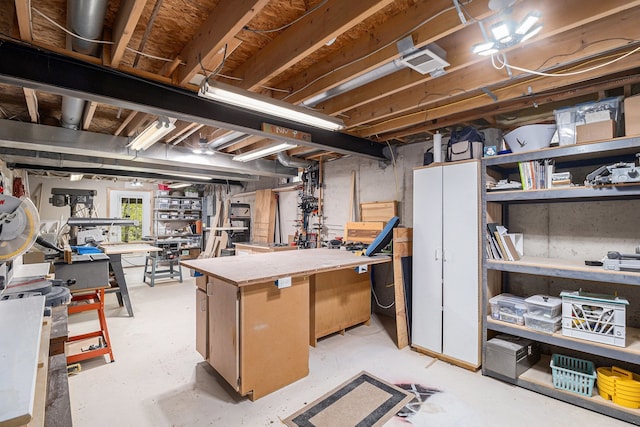 975 Pine Needle Trl, Rochester, MI 48306 - below grade area with a workshop area