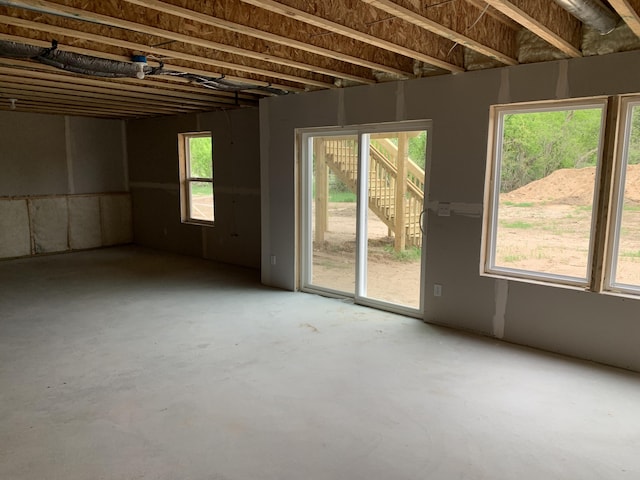 1060 N Wahington St, Lowell, MI 49331 - empty room with concrete flooring