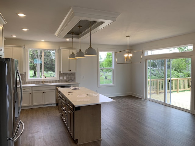 1060 N Wahington St, Lowell, MI 49331 - kitchen featuring stainless steel refrigerator with ice dispenser, a sink, plenty of natural light, and recessed lighting