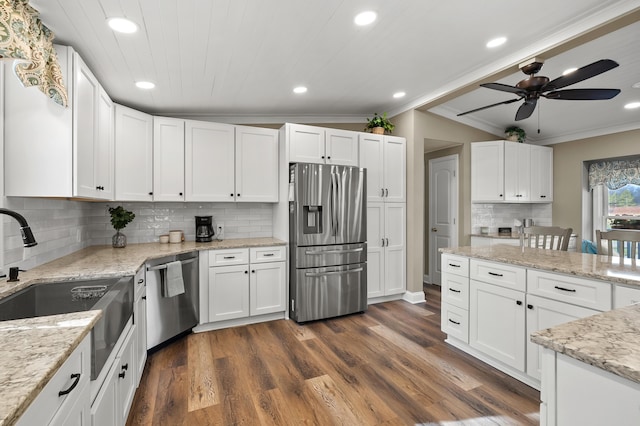kitchen featuring crown molding, a ceiling fan, white cabinetry, recessed lighting, and appliances with stainless steel finishes