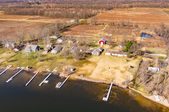 aerial view with a rural view and a water view