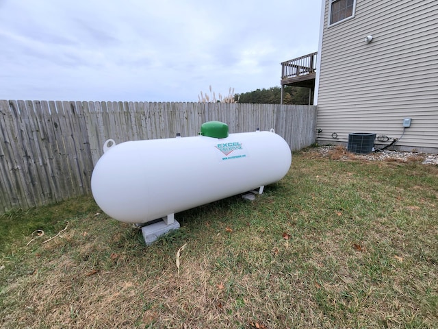 6039 W Morris Lake Rd, Mears, MI 49436 - details with heating fuel, central air condition unit, and fence