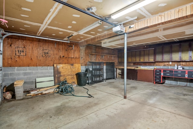 20100 Wick Rd, Taylor, MI 48180 - garage with a workshop area and a garage door opener