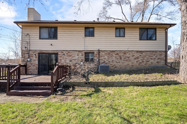 20100 Wick Rd, Taylor, MI 48180 - back of house featuring a lawn, a wooden deck, brick siding, and a chimney