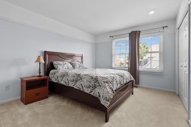 7511 Dunross Dr, Portage, MI 49024 - carpeted bedroom featuring baseboards and a closet