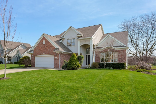 7511 Dunross Dr, Portage, MI 49024 - traditional-style house with a front lawn, driveway, a garage, brick siding, and roof with shingles