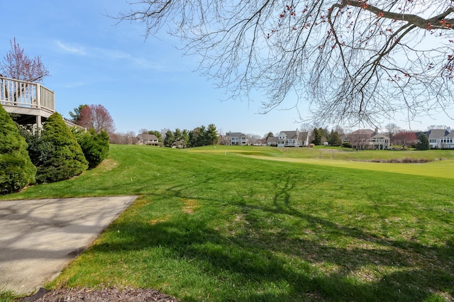 7511 Dunross Dr, Portage, MI 49024 - view of home's community with a lawn and a residential view