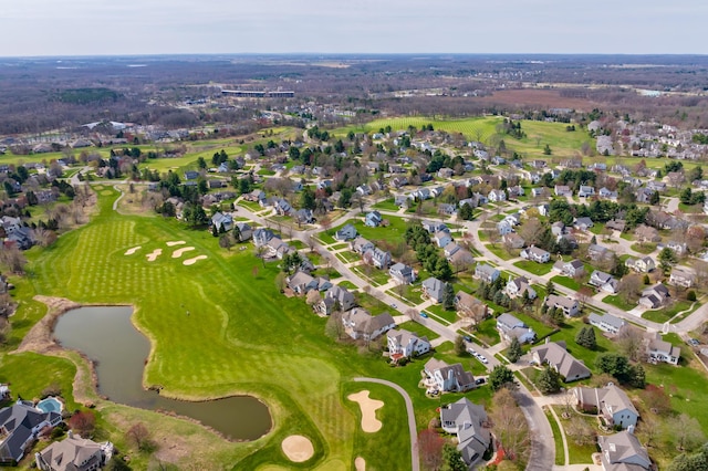 7511 Dunross Dr, Portage, MI 49024 - drone / aerial view with golf course view, a residential view, and a water view