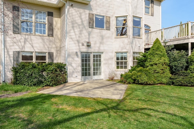 7511 Dunross Dr, Portage, MI 49024 - rear view of property featuring a lawn and a patio