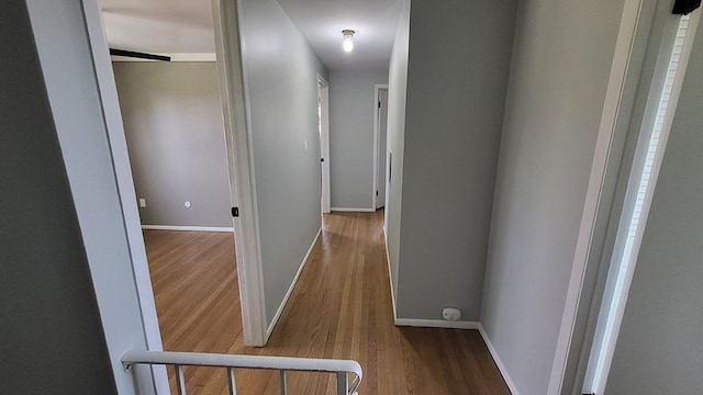 23528 King Dr, Clinton Township, MI 48035 - hallway featuring wood finished floors and baseboards